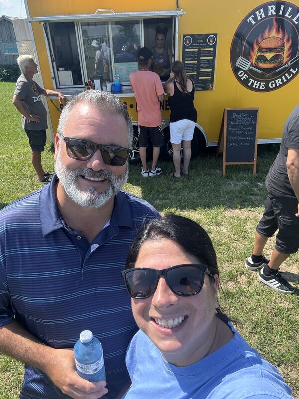 Selfie of Fred Drodge and a friend at a food-truck event